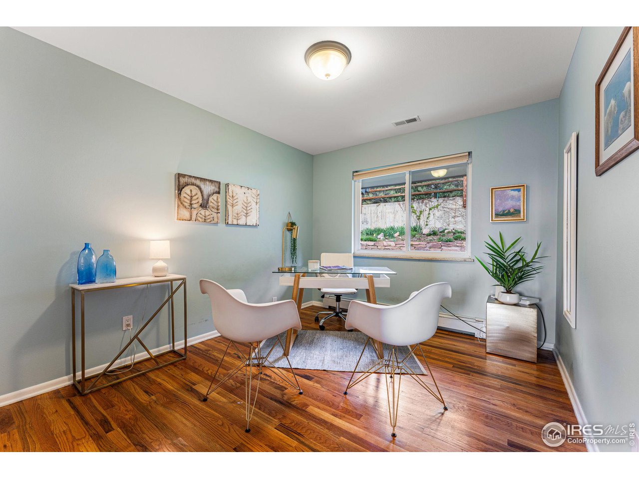 3880 Cloverleaf Drive Boulder, CO 80304 - Photo 20 of 38 a living room with furniture and a window