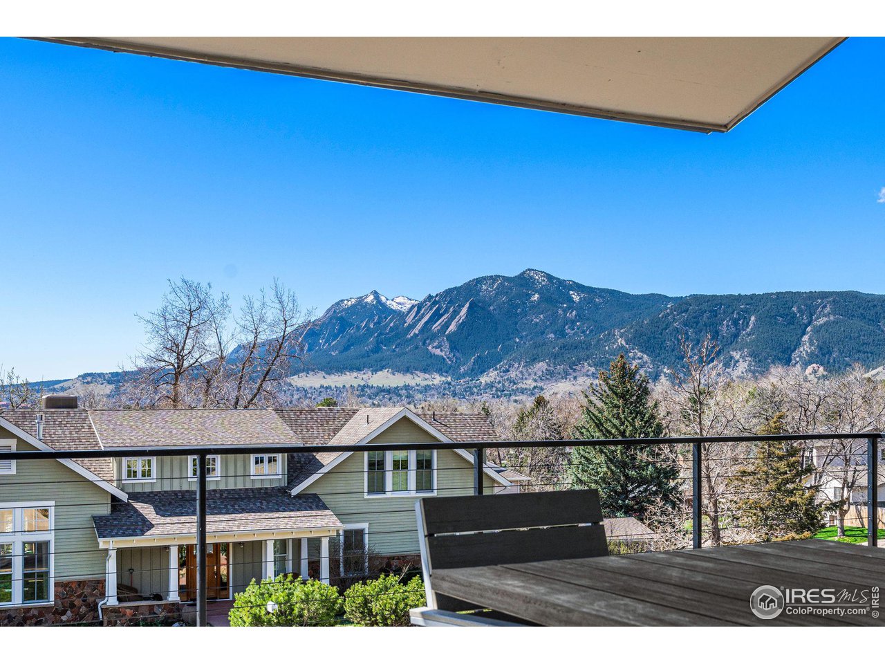 3880 Cloverleaf Drive Boulder, CO 80304 - Photo 2 of 38 a front view of a house with a yard