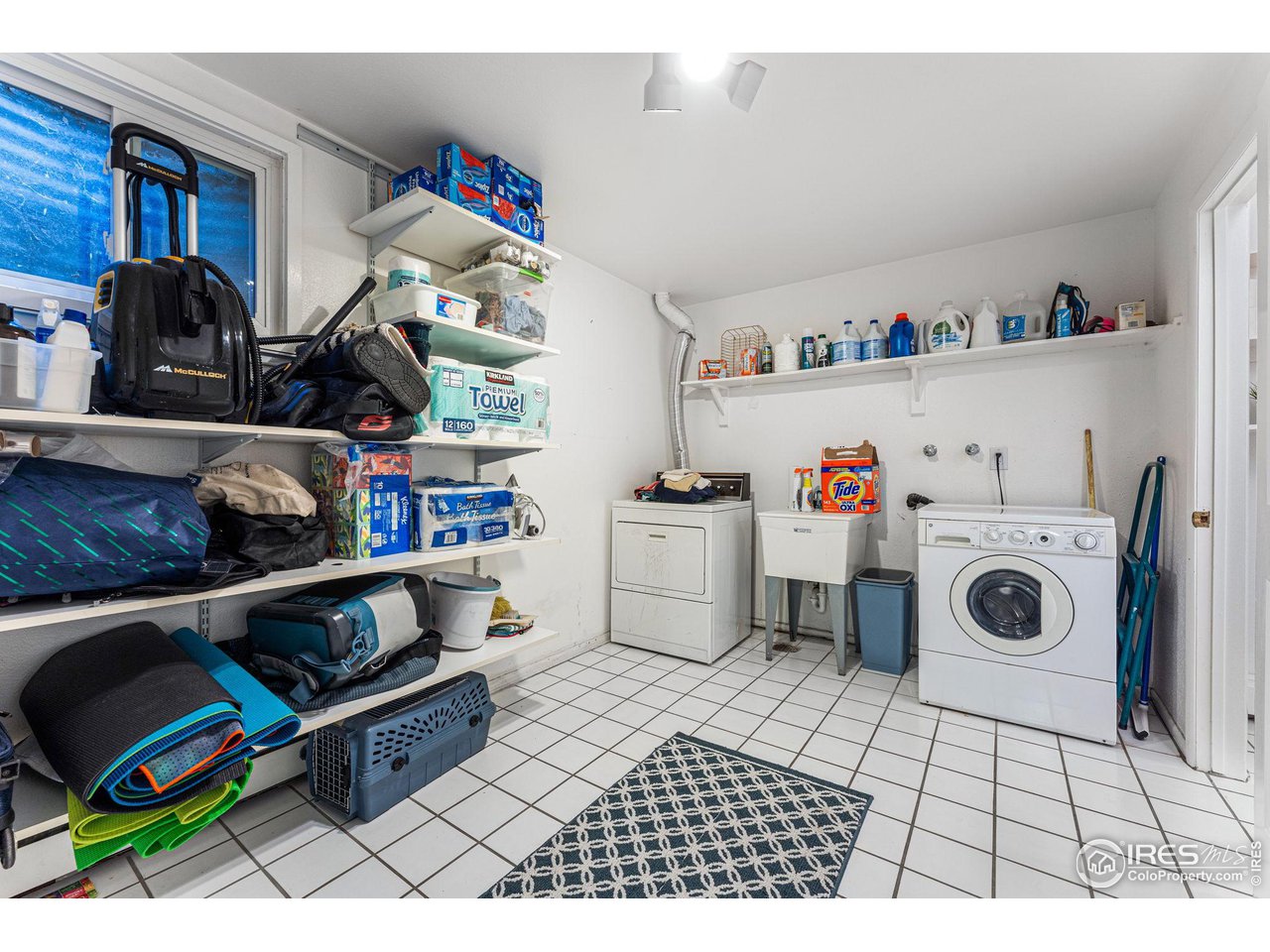 3880 Cloverleaf Drive Boulder, CO 80304 - Photo 30 of 38 a storage room with washer and dryer