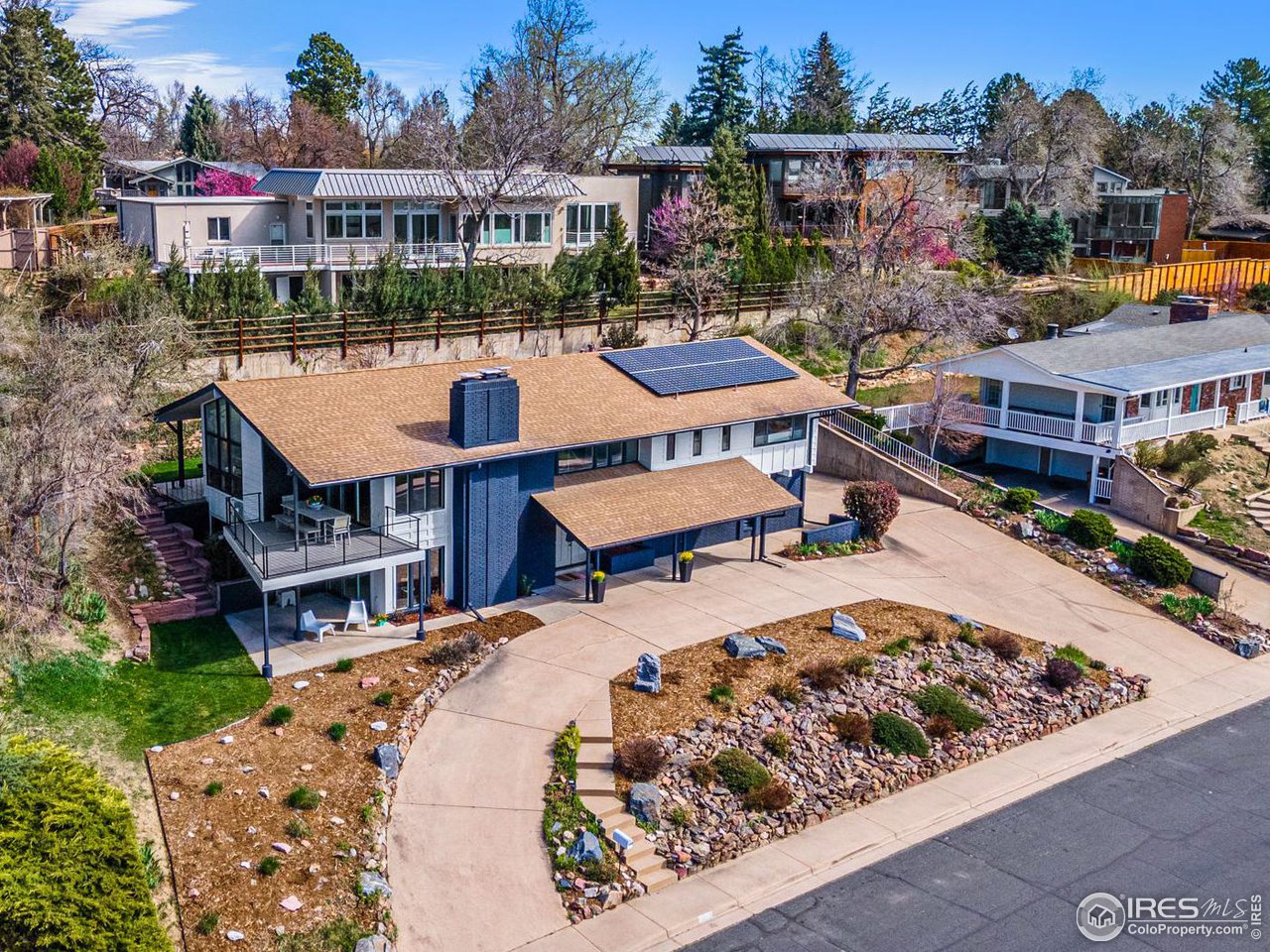 3880 Cloverleaf Drive Boulder, CO 80304 - Photo 33 of 38 an aerial view of a house with swimming pool and outdoor seating