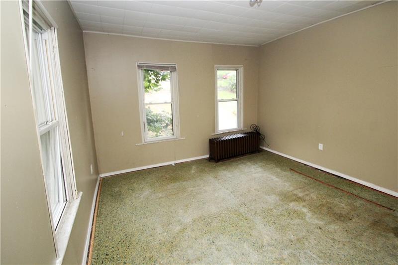 2311 Spring Street Pittsburgh, PA 15210 - Photo 21 of 24 3rd bedroom--carpet has been pulled up--pad left! Add your favorite floor covering!
