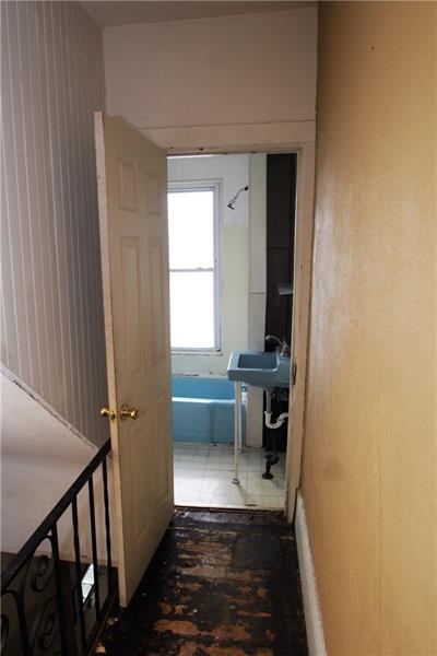 2311 Spring Street Pittsburgh, PA 15210 - Photo 23 of 24 Small Bathroom at the end of the upstairs (2nd floor) hall way.