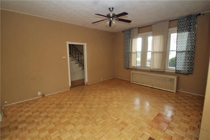 2311 Spring Street Pittsburgh, PA 15210 - Photo 7 of 24 High ceilings through out--large 17x15 living room!