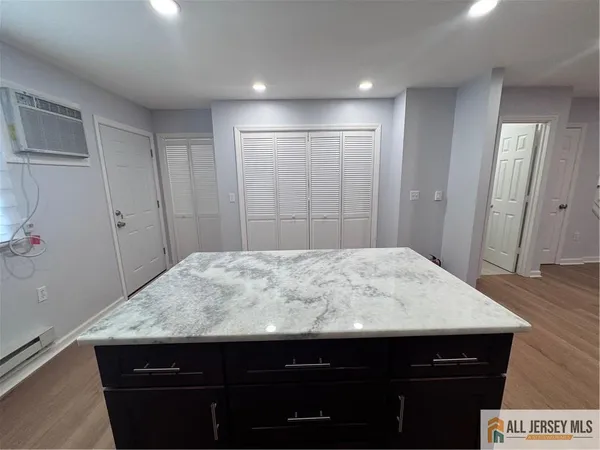a bathroom with a sink and vanity
