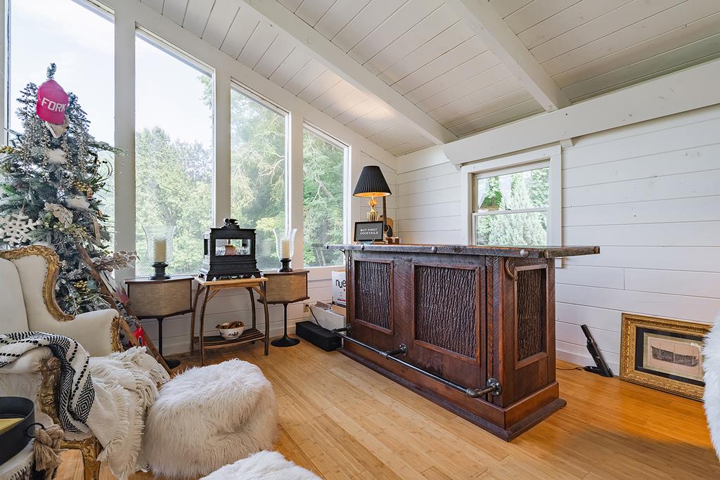 328 Black Ankle Creek Road Cherry Log, GA 30522 - Photo 27 of 103 a living room with furniture and a floor to ceiling window