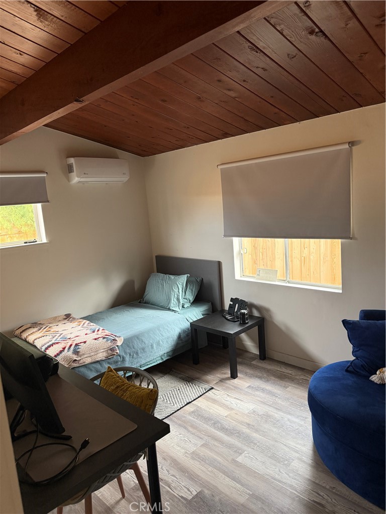 6922 Datura Avenue Twentynine Palms, CA 92277 - Photo 14 of 24 a living room with furniture and a window