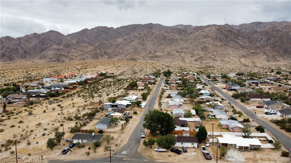 6922 Datura Avenue Twentynine Palms, CA 92277 - Photo 24 of 24 an aerial view of residential house and sandy dunes