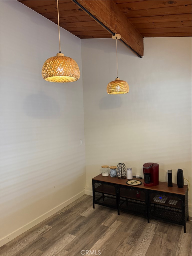 6922 Datura Avenue Twentynine Palms, CA 92277 - Photo 9 of 24 a view of a workspace with wooden floor