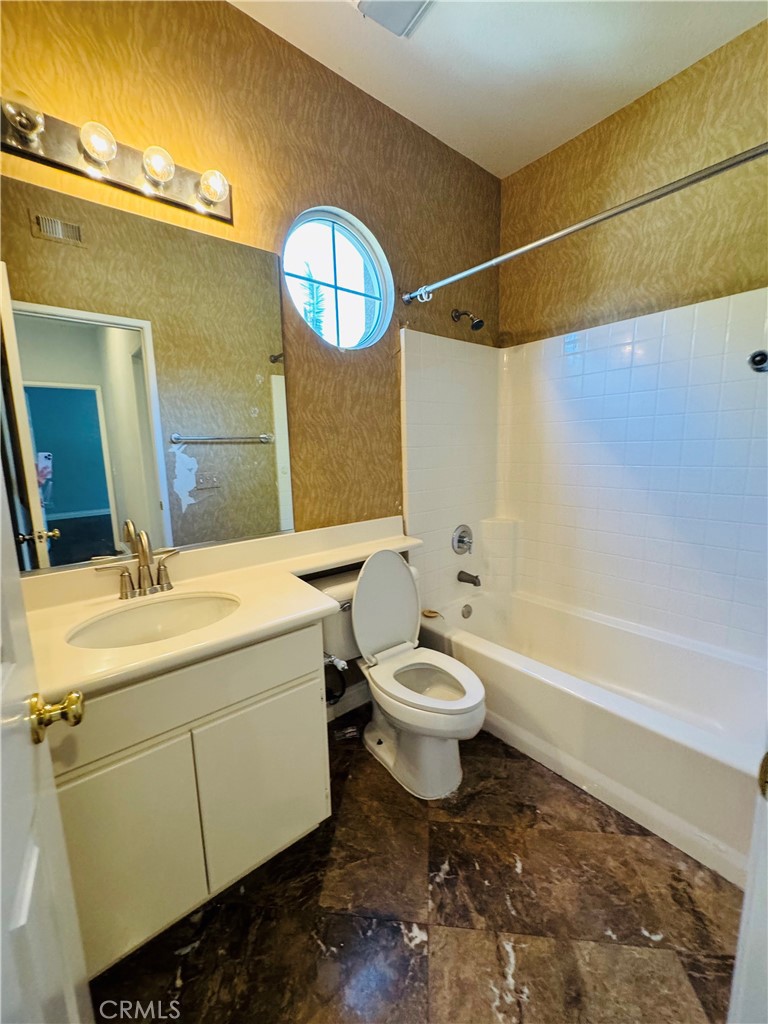 3 Bradford Irvine, CA 92602 - Photo 11 of 21 a bathroom with a toilet sink and mirror
