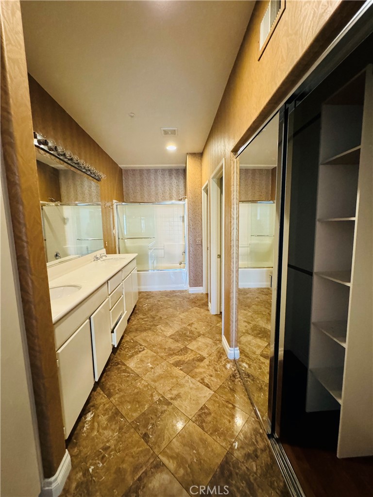 3 Bradford Irvine, CA 92602 - Photo 16 of 21 a bathroom with a tub and shower