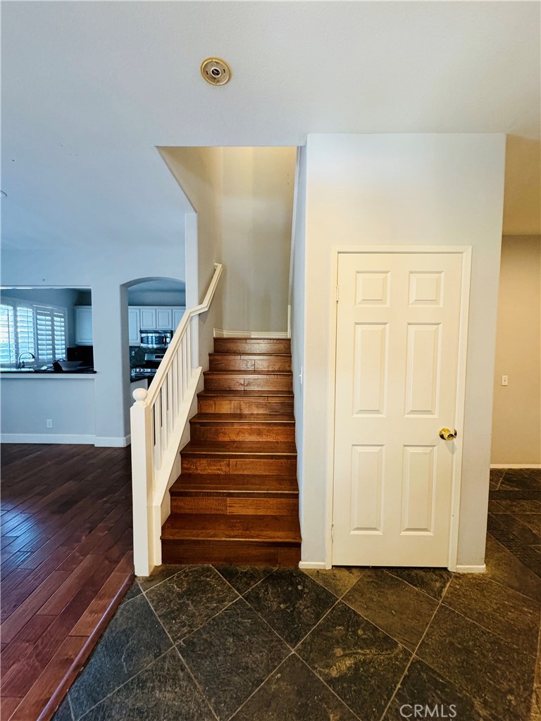 3 Bradford Irvine, CA 92602 - Photo 3 of 21 a view of a hallway with wooden floor and entryway