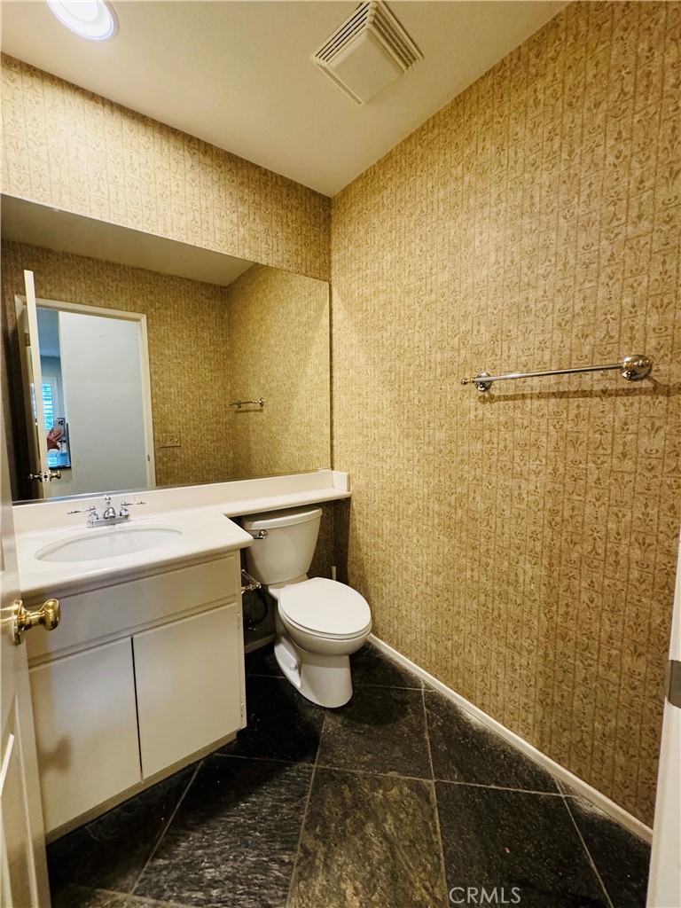 3 Bradford Irvine, CA 92602 - Photo 8 of 21 a bathroom with a sink a toilet and shower