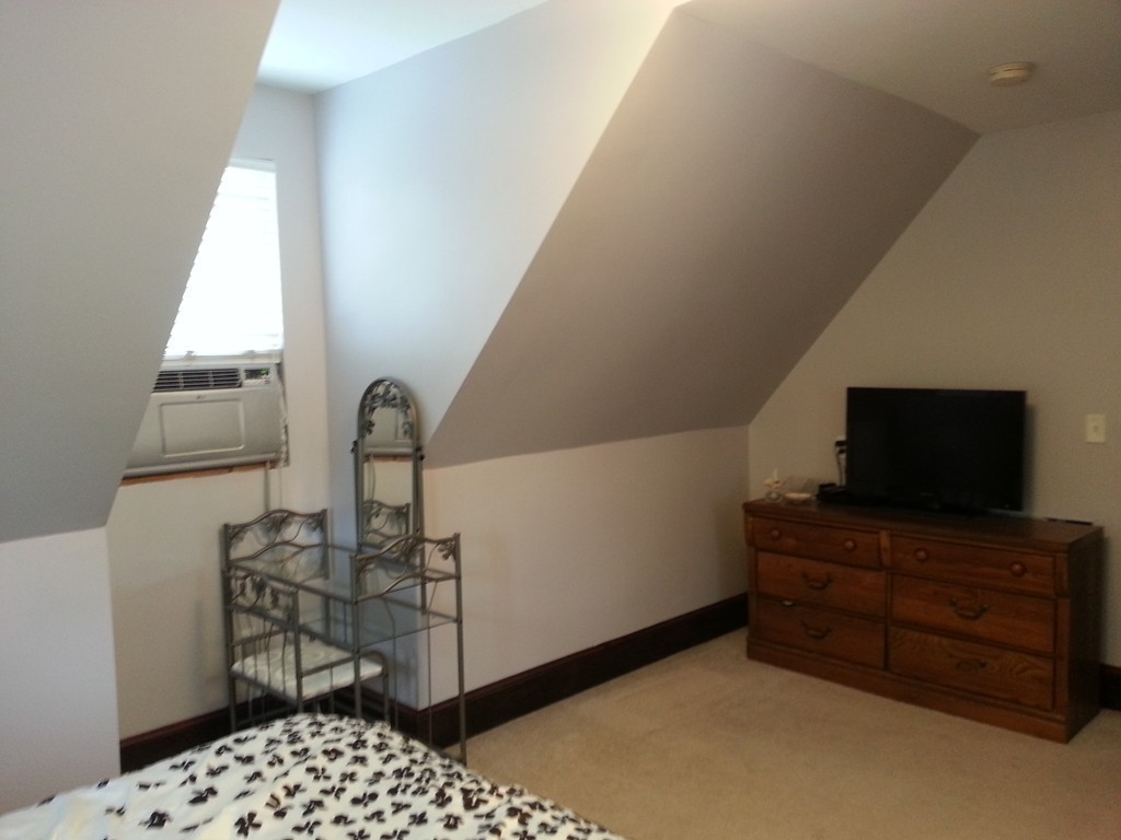 7 Doane Road Ware, MA 01082 - Photo 12 of 19 a living room with furniture and flat screen tv