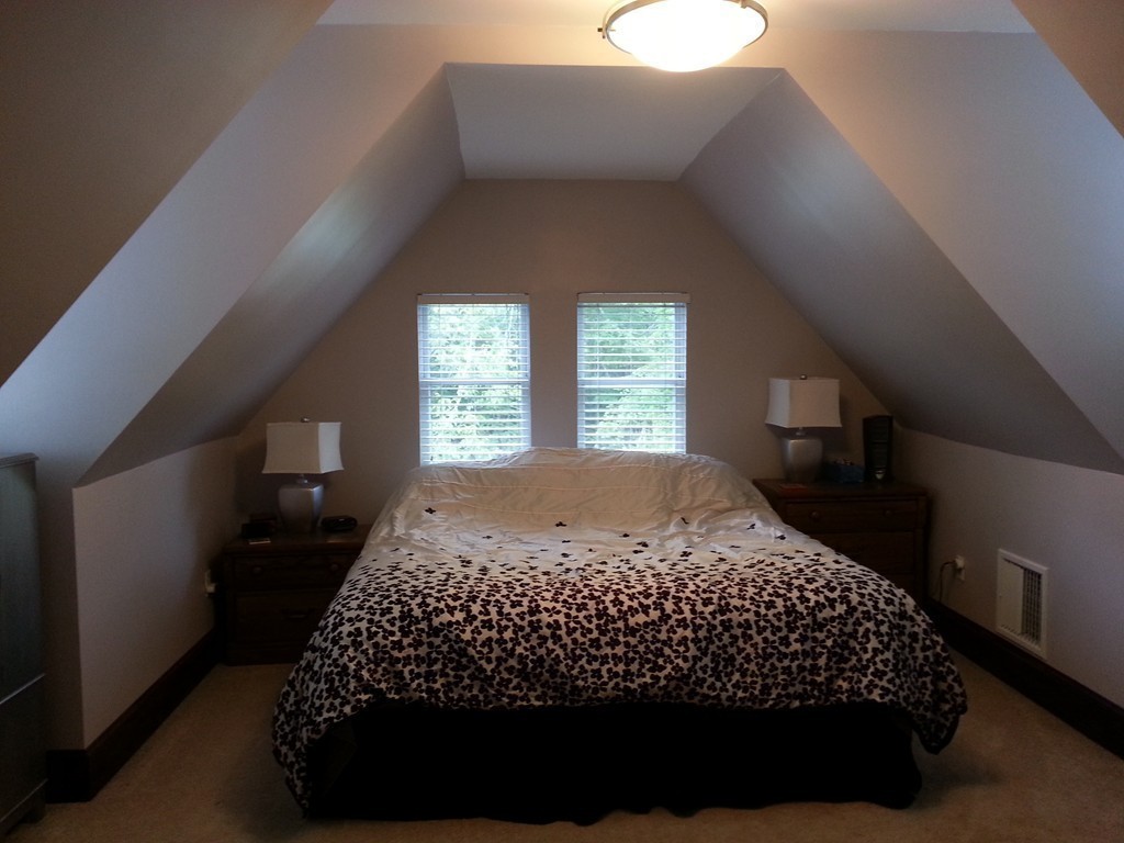 7 Doane Road Ware, MA 01082 - Photo 16 of 19 a bedroom with a bed and window