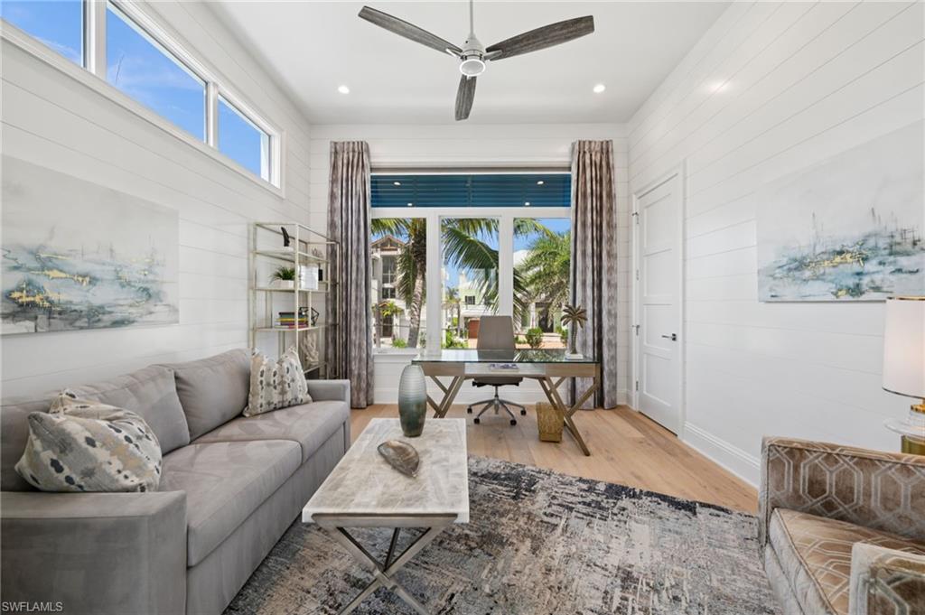 26659 Hickory Boulevard Bonita Springs, FL 34134 - Photo 21 of 46 a living room with furniture and a large window