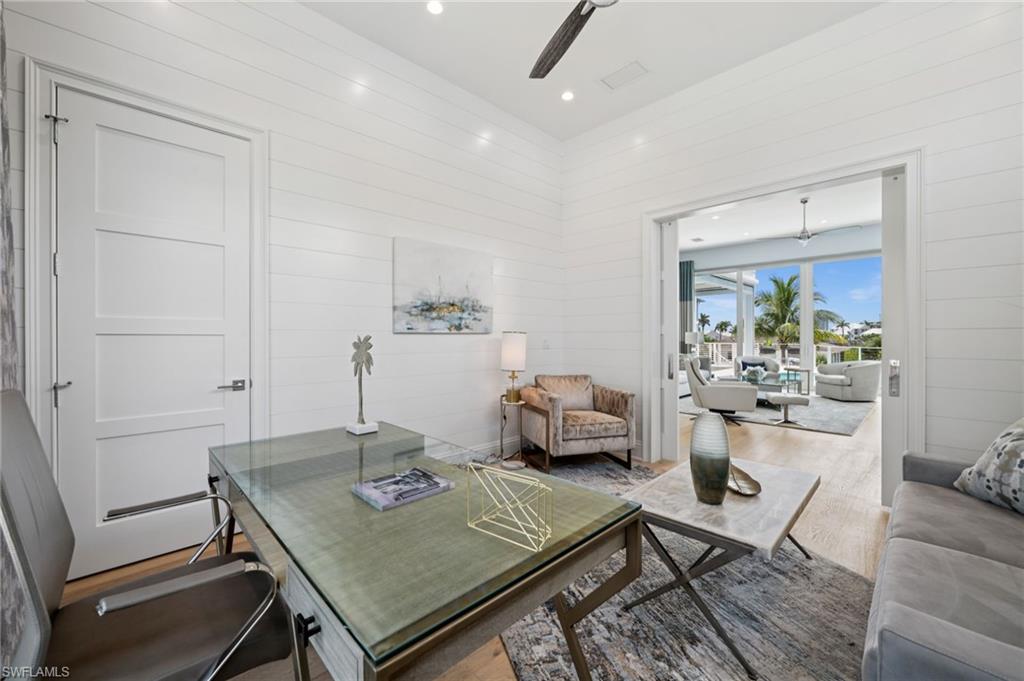 26659 Hickory Boulevard Bonita Springs, FL 34134 - Photo 22 of 46 a living room with furniture