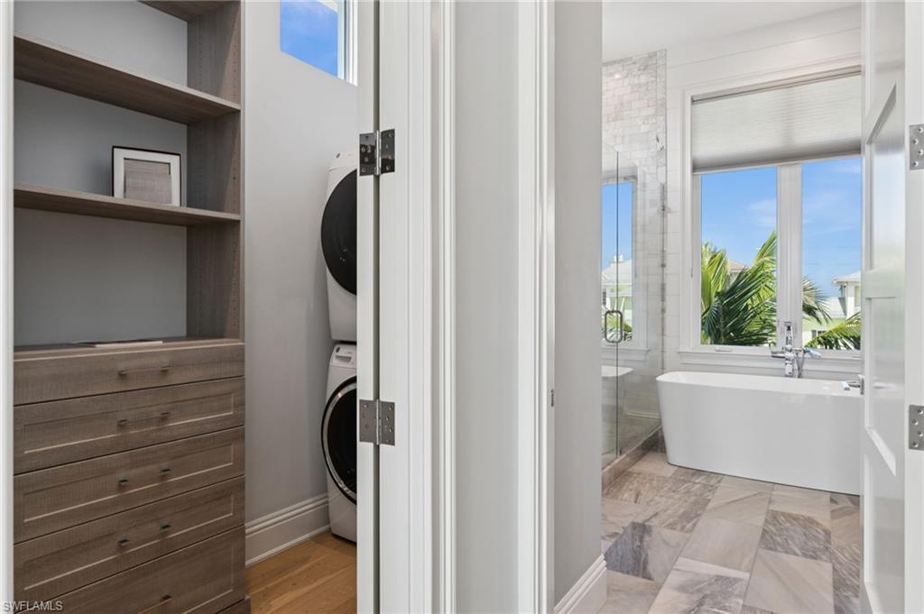 26659 Hickory Boulevard Bonita Springs, FL 34134 - Photo 32 of 46 a view of walk in closet and bedroom