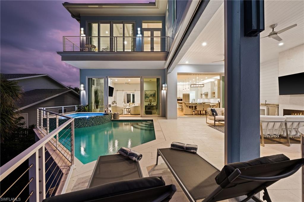 26659 Hickory Boulevard Bonita Springs, FL 34134 - Photo 45 of 46 a living room with furniture and a window