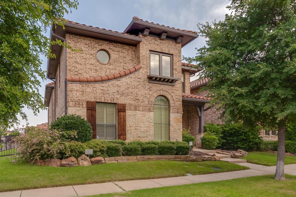 803 La Cima Irving, TX 75039 - Photo 1 of 1 a front view of a house with garden
