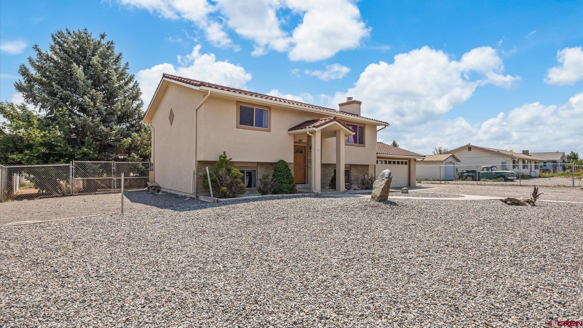 2600 1585 Road Delta, CO 81416 - Photo 6 of 33 a view of a house with a backyard