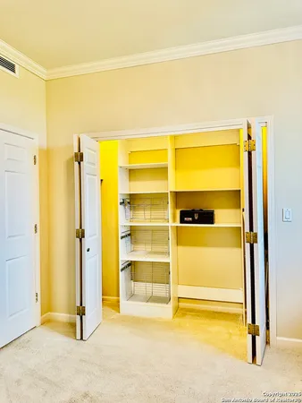 a view of walk in closet with empty space