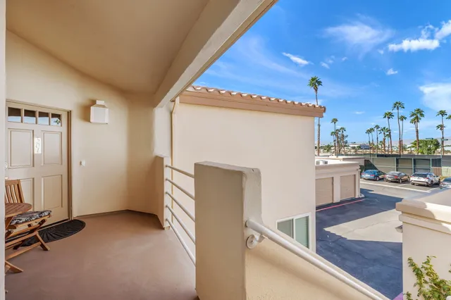a view of a kitchen with furniture and a kitchen