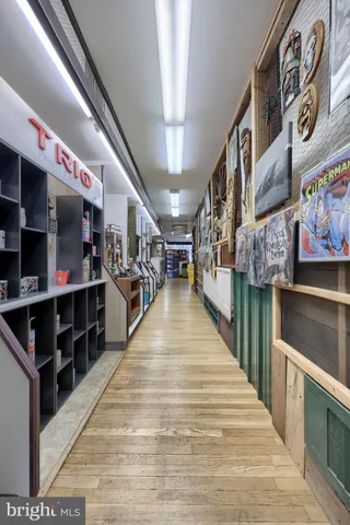 a view of a livingroom with furniture and toys
