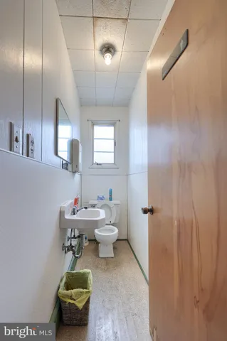 a large room with lots of table and chairs