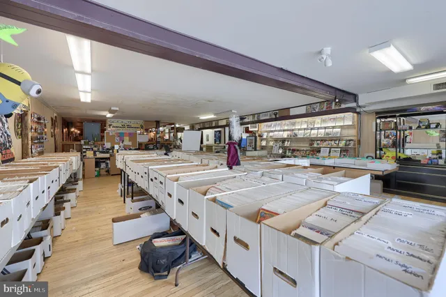a view of dining room with furniture wooden floor and a rug