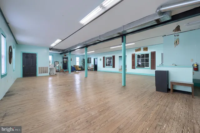 a bathroom with a toilet a sink and a vanity