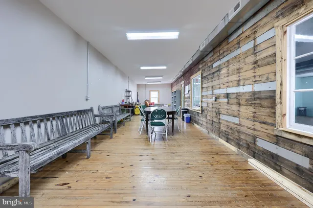 a kitchen with sink and cabinets