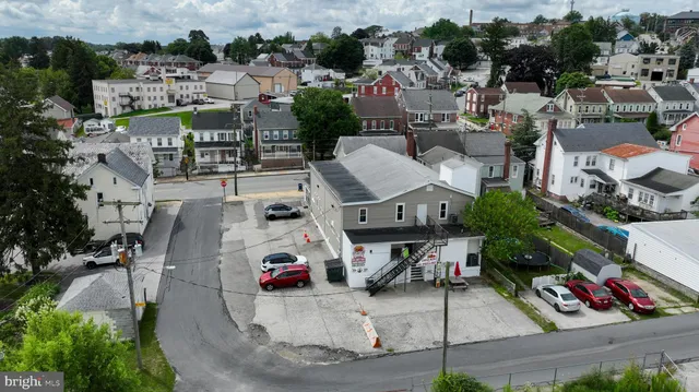 a front view of a building with glass windows