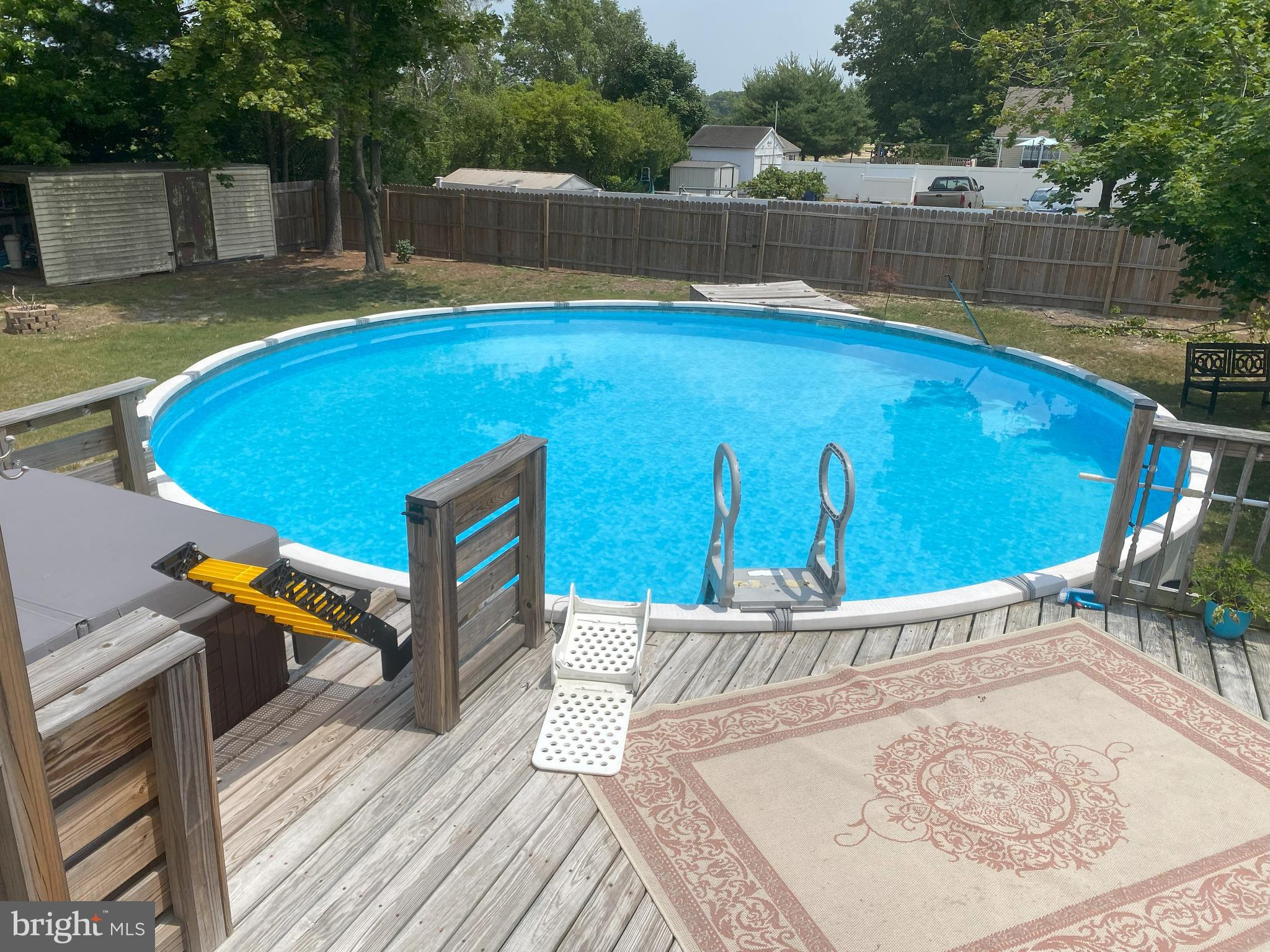 101 Michael Street Buena, NJ 08310 - Photo 20 of 28 a view of a backyard with a small pool