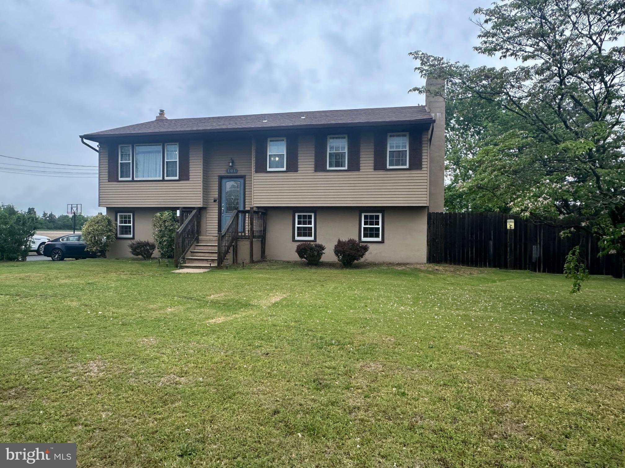 101 Michael Street Buena, NJ 08310 - Photo 28 of 28 a front view of a house with a garden