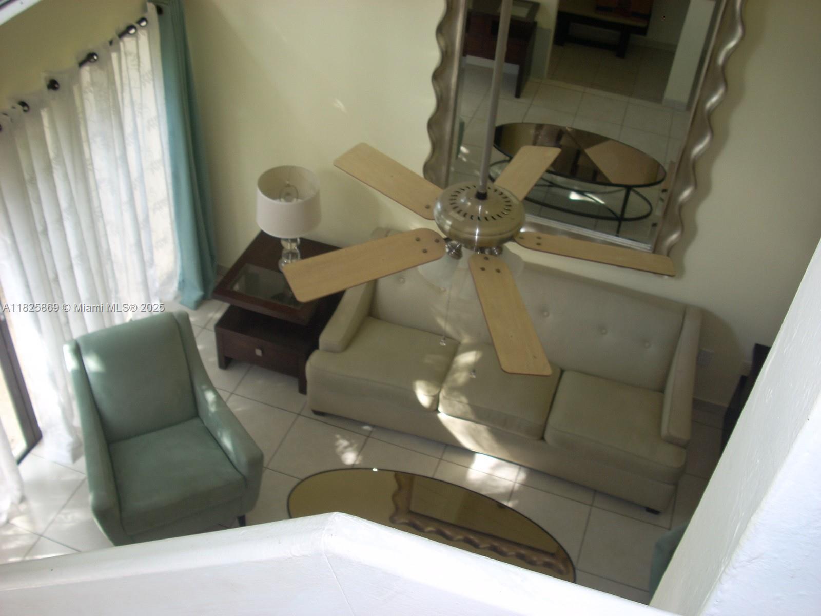 Ojus Miami, FL 33180 - Photo 12 of 15 a living room with furniture and wooden floor