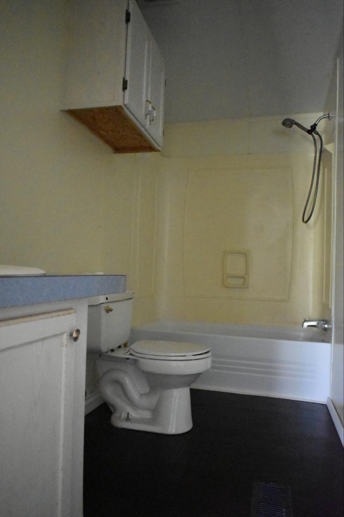 8607 Burleson Manor Road, Unit A Manor, TX 78653 - Photo 10 of 11 a bathroom with a sink and a toilet