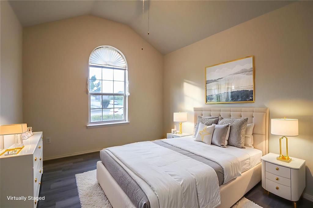 2004 Lennox Lane Arlington, TX 76018 - Photo 11 of 14 a bedroom with a bed and a window