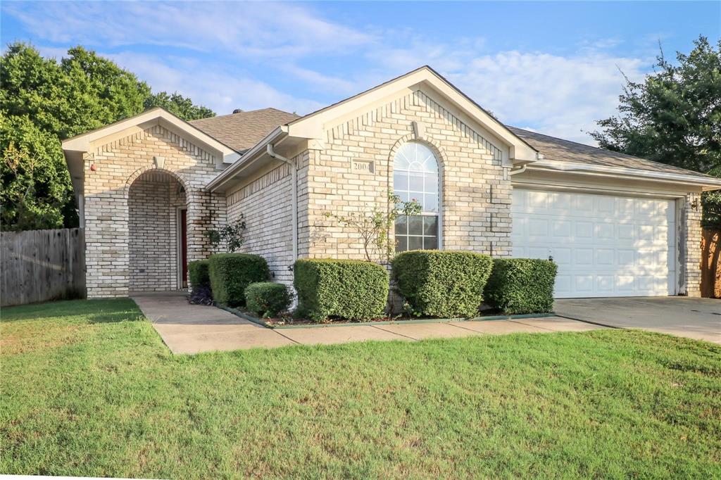 2004 Lennox Lane Arlington, TX 76018 - Photo 2 of 14 a front view of a house with a yard