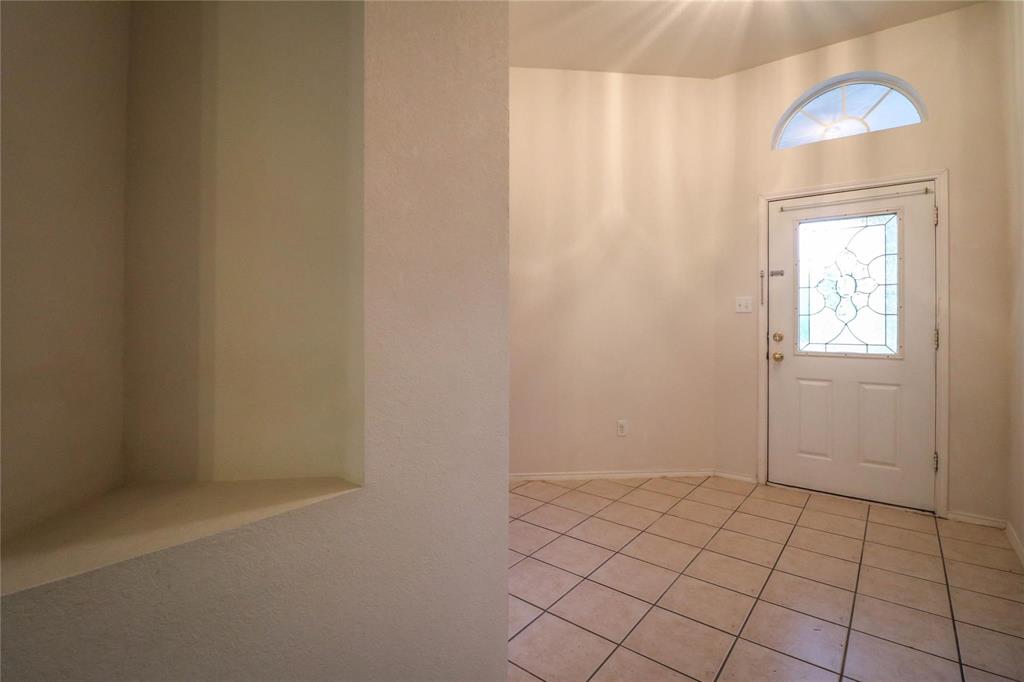 2004 Lennox Lane Arlington, TX 76018 - Photo 3 of 14 a view of an empty room