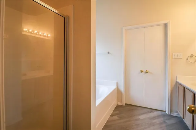 a view of a hallway with closet