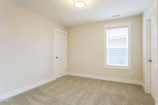 a view of a room with a window