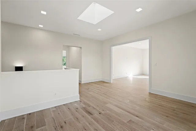 a kitchen with stainless steel appliances and cabinets