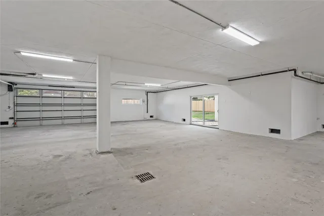 a view of entryway with wooden floor and stairs