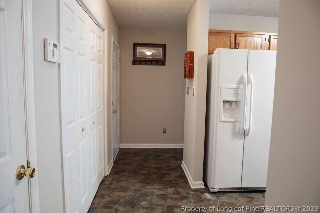 5804 Bibar Road Fayetteville, NC 28304 - Photo 15 of 37 a view of a livingroom with wooden floor