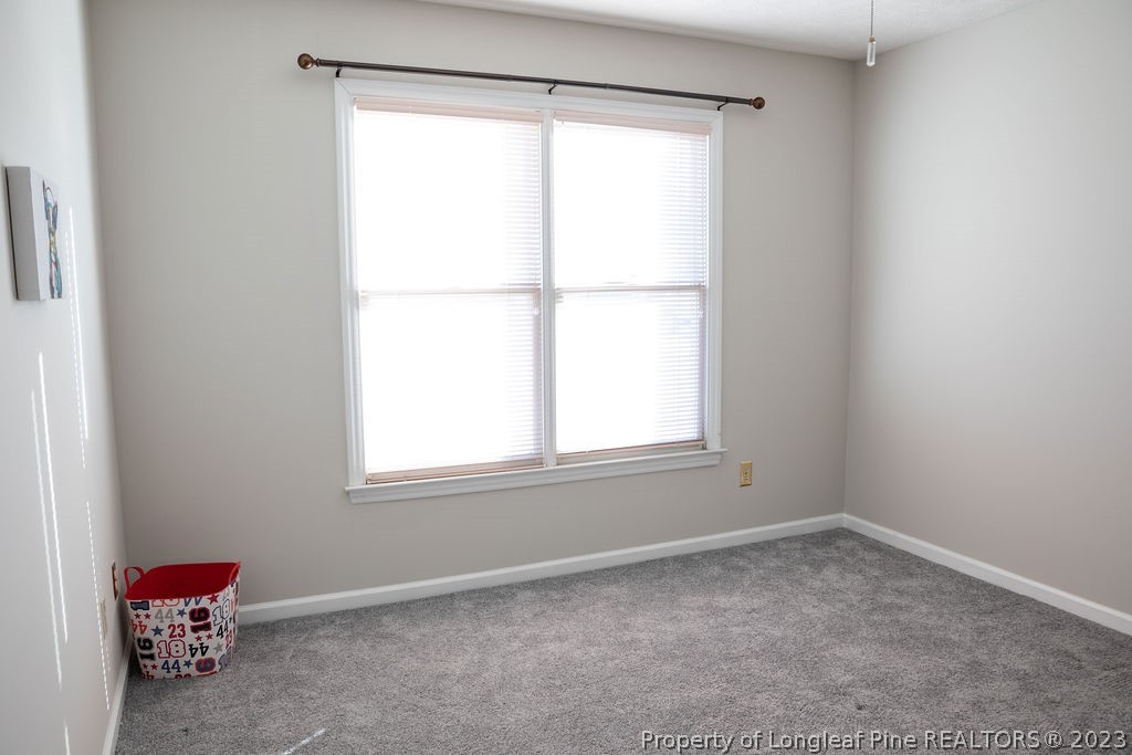 5804 Bibar Road Fayetteville, NC 28304 - Photo 23 of 37 an empty room with a window