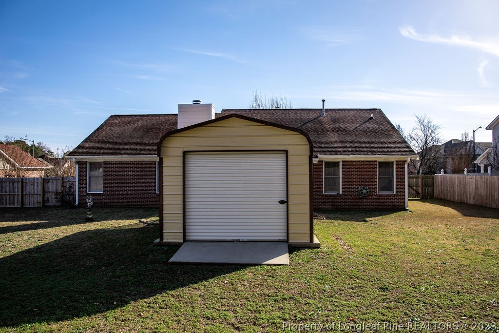 5804 Bibar Road Fayetteville, NC 28304 - Photo 32 of 37 a front view of a house with a yard