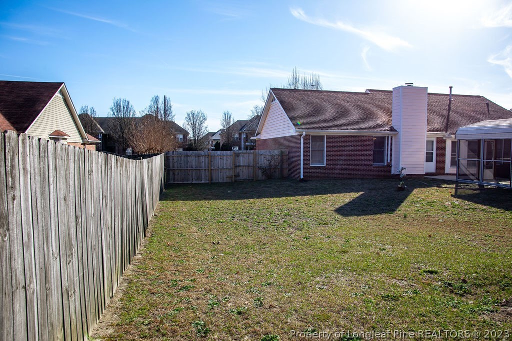 5804 Bibar Road Fayetteville, NC 28304 - Photo 36 of 37 a view of a house with wooden fence