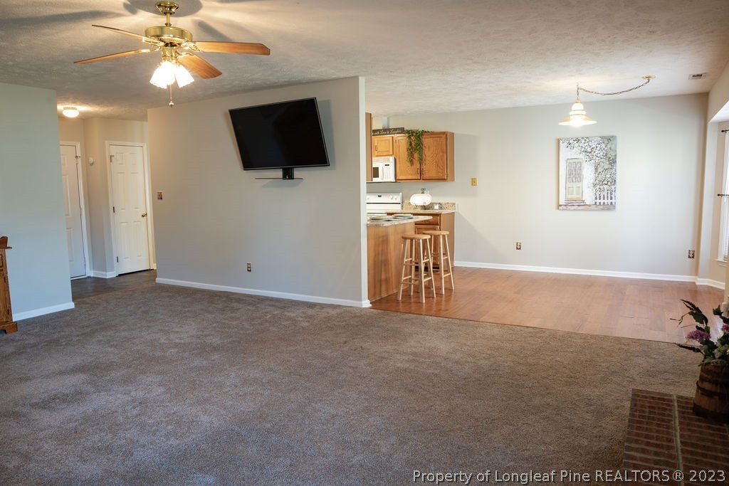 5804 Bibar Road Fayetteville, NC 28304 - Photo 7 of 37 a view of a livingroom with a flat screen tv