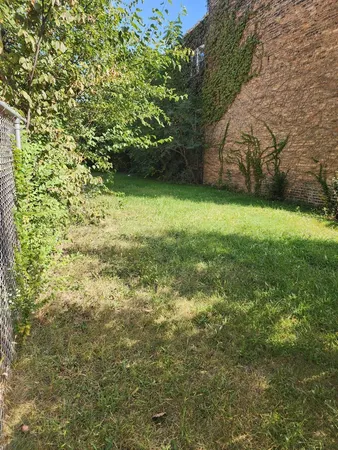 a view of outdoor space and yard