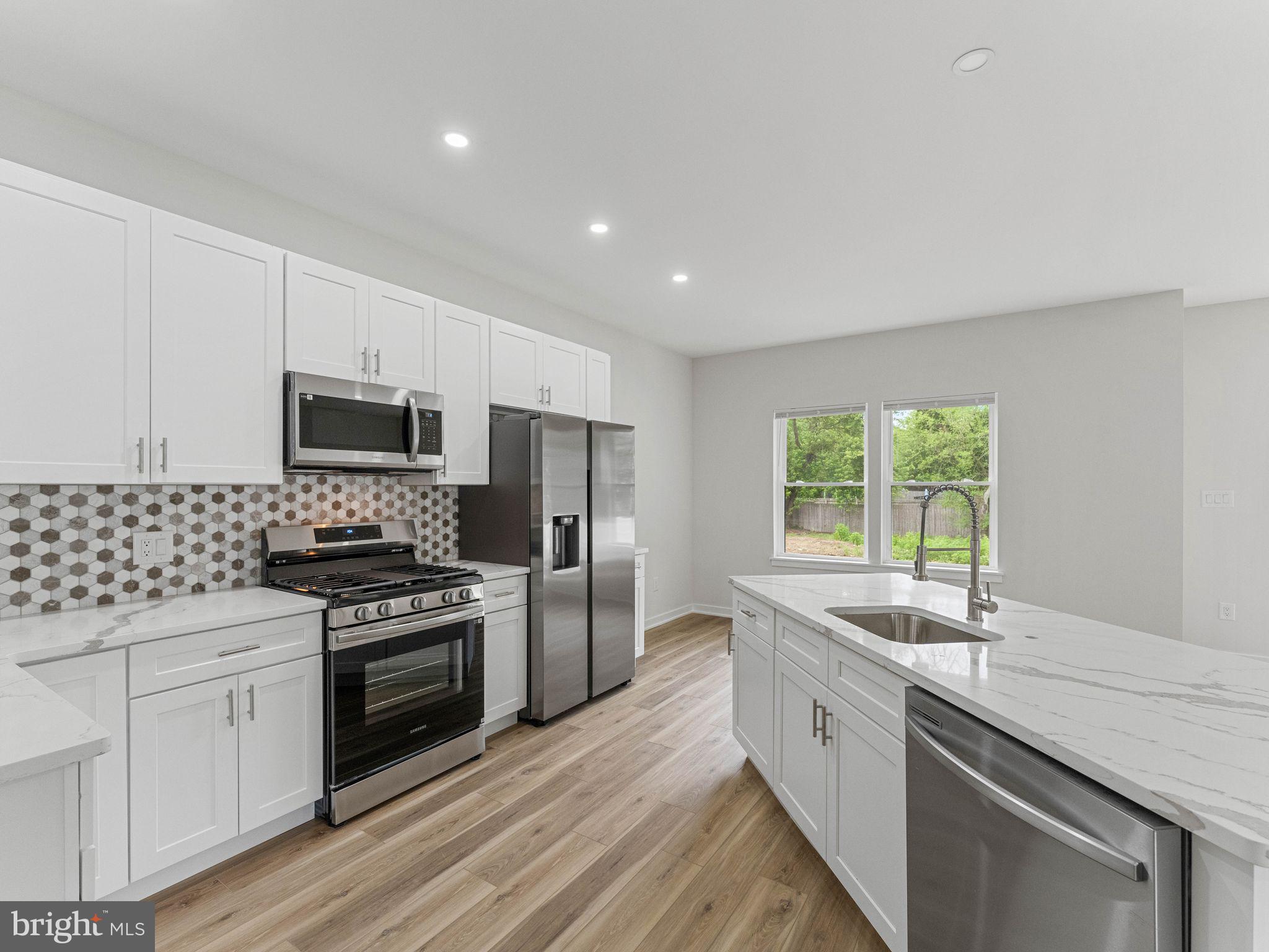 423 Almonesson Road Blackwood, NJ 08012 - Photo 16 of 40 Modern kitchen with sleek finishes.